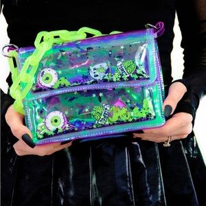 Electric bubblegum Holographic Eyeball Clutch with Green Chain sold out